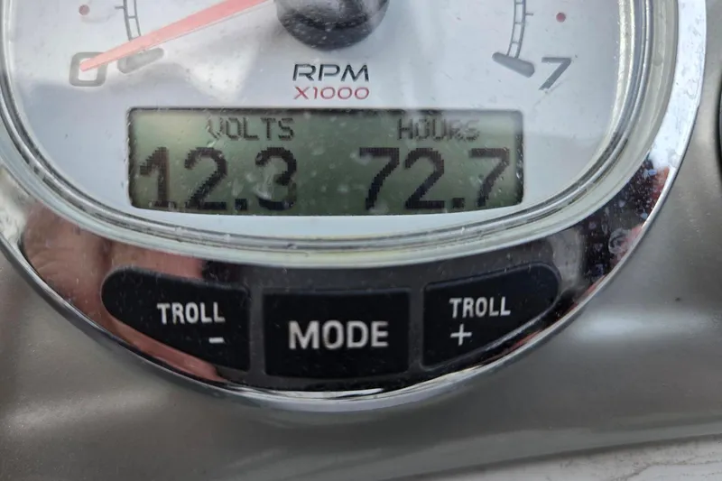 Slide: The Image of Close-up of a 2018 Tahoe 2150 gauge showing 12.3 volts and 72.7 hours. - 6