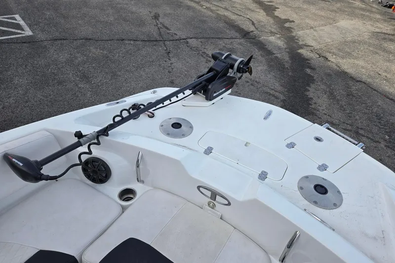 Slide: The Image of 2018 Tahoe 2150 boat deck with trolling motor and seating area. - 9