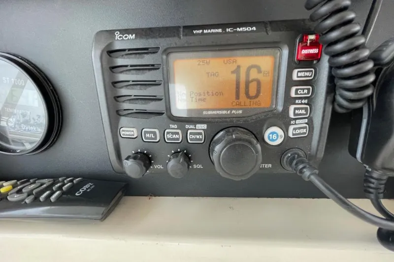 Slide: The Image of VHF marine radio on 1990 Offshore Yachts 55 Pilothouse, channel 16 active. - 38