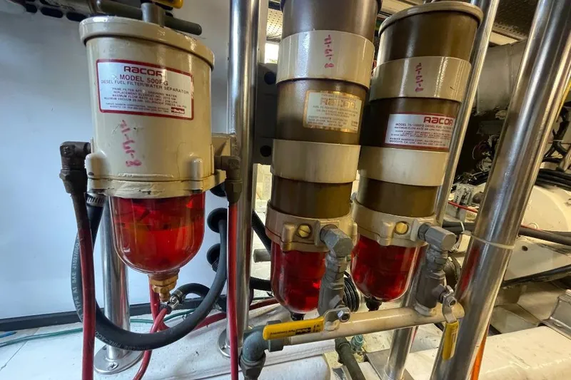 Slide: The Image of Racor diesel fuel filters in 1990 Offshore Yachts 55 Pilothouse engine room. - 50