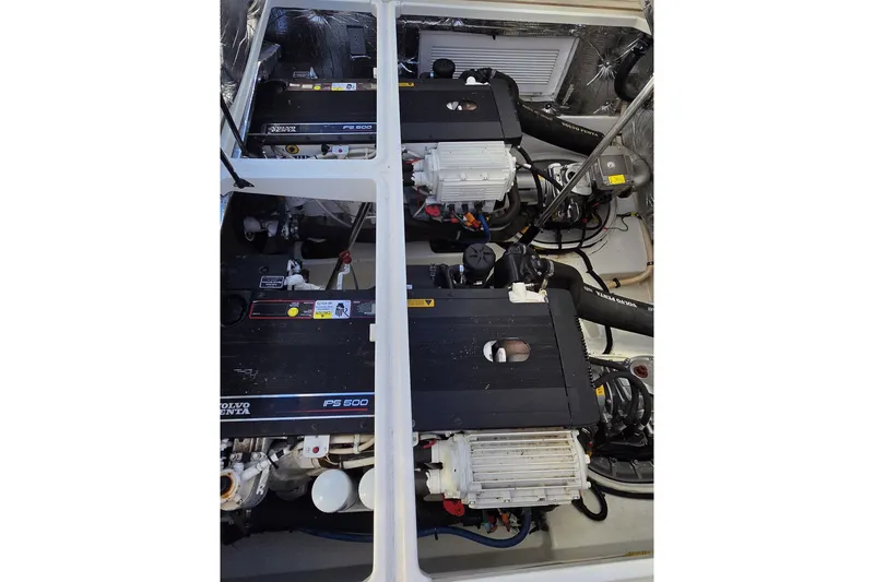 Slide: The Image of Engine compartment of a 2011 MJM 40z Downeast boat featuring Volvo Penta IPS 600 engines. - 42