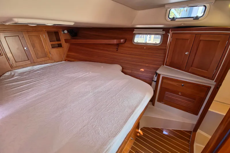 Slide: The Image of Luxurious cabin interior of 2011 MJM 40z Downeast yacht with wooden cabinetry. - 33