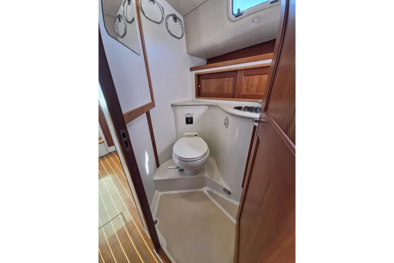 Slide: The Image of 2011 MJM 40z Downeast yacht bathroom with wooden cabinetry and modern fixtures. - 38