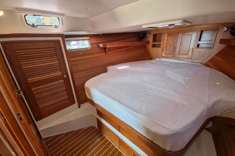 Slide: The Image of Luxurious cabin interior of 2011 MJM 40z Downeast yacht with wooden finishes. - 32