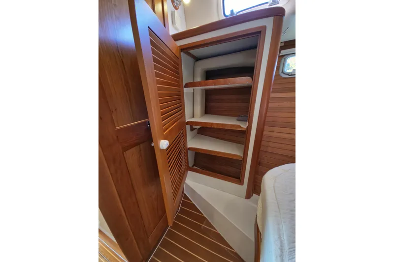 Slide: The Image of Wooden interior shelving in 2011 MJM 40z Downeast boat cabin. - 34