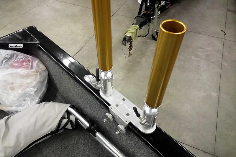 Slide: The Image of 2022 Tracker Pro Guide V-16 WT boat with gold rod holders and Versatrack system. - 33