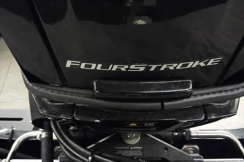 Slide: The Image of 2022 Tracker Pro Guide V-16 WT four-stroke engine close-up. - 34