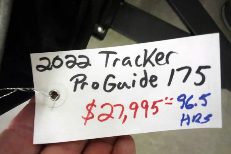 Slide: The Image of Price tag for 2022 Tracker Pro Guide V-16 WT, $27,995, 96.5 hours. - 35