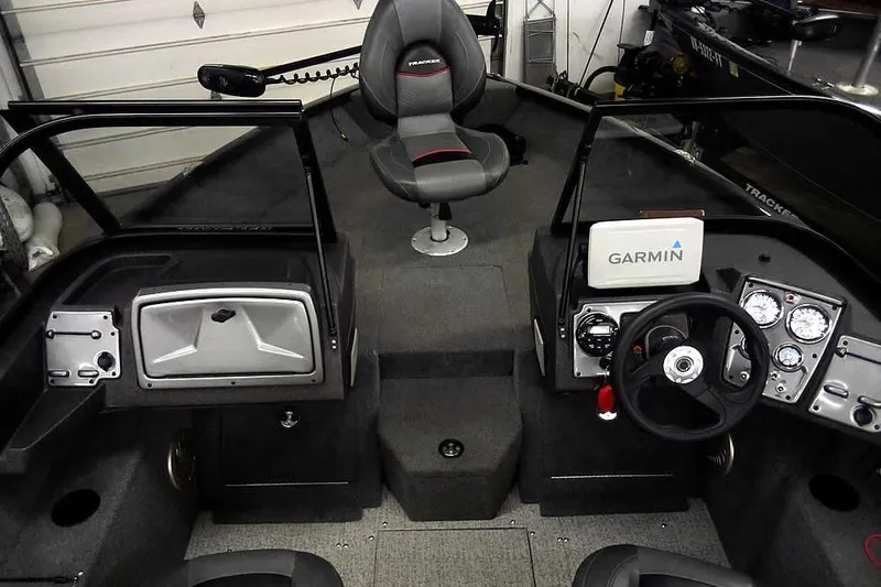 Slide: The Image of 2022 Tracker Pro Guide V-16 WT boat interior with Garmin navigation system. - 8
