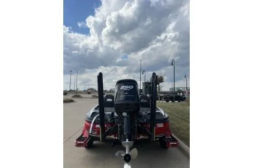 Slide: The Image of 2017 Nitro Z20 Pro boat with 150 HP engine under cloudy sky. - 2