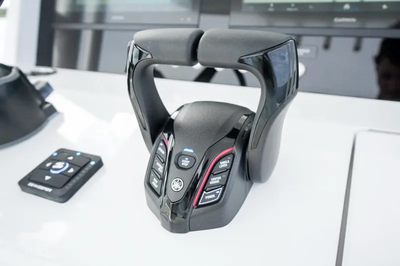 Slide: The Image of Compact bathroom in 2026 Jupiter 30 model boat, featuring a toilet and storage. - 14