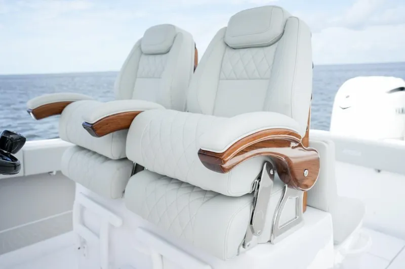 Slide: The Image of Open storage compartment in 2026 Jupiter 30 boat, showcasing interior layout and components. - 16