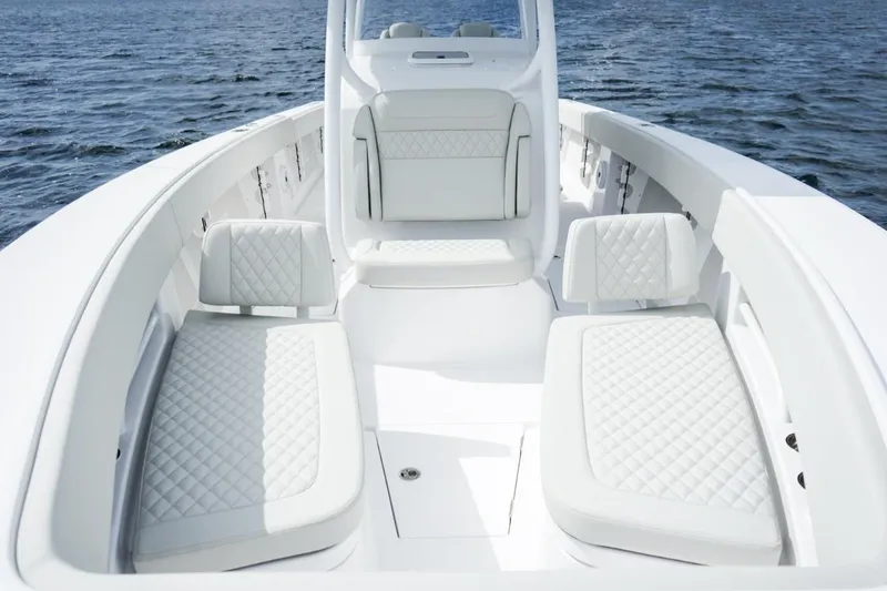 Slide: The Image of Steering console of 2026 Jupiter 30 boat with navigation screens and controls. - 23