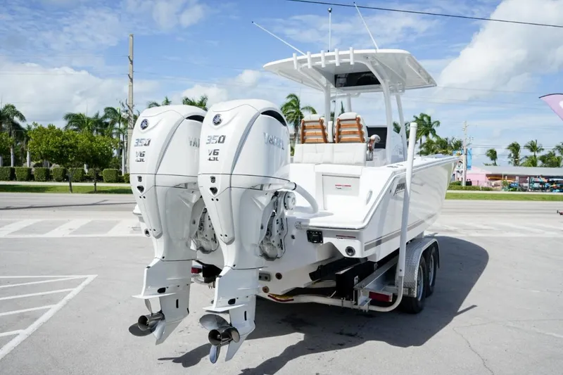 Slide: The Image of 2026 Jupiter 30 boat on open water, aerial view. - 3