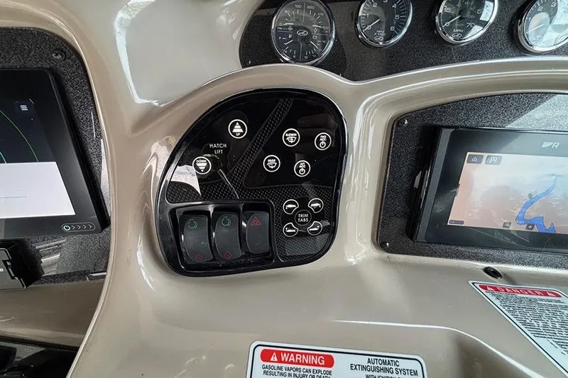 Slide: The Image of 2005 Sea Ray 340 Sundancer dashboard with navigation and control panel. - 17