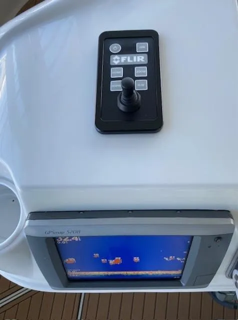 Slide: The Image of Control panel and display on a 1999 Carver 456 Aft Cabin Motor Yacht. - 13