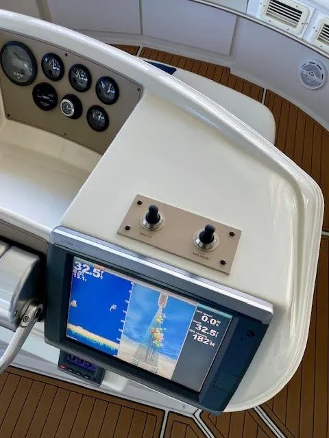 Slide: The Image of Control panel of 1999 Carver 456 Aft Cabin Motor Yacht with navigation display. - 37