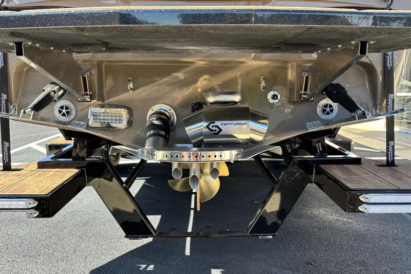 Slide: The Image of 2026 Centurion Ri265 boat stern with propeller and exhaust system. - 5