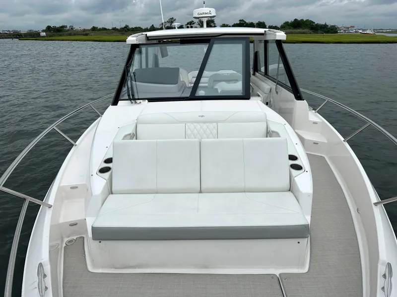 Slide: The Image of Interior view of a 2022 Regal 36 XO boat engine room. - 24