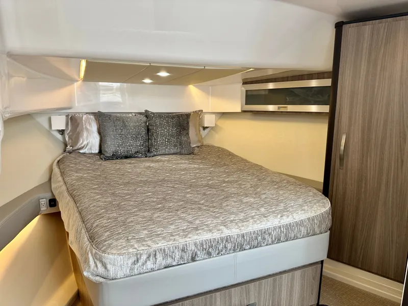 Slide: The Image of Engine compartment of 2022 Regal 36 XO with battery and equipment. - 26