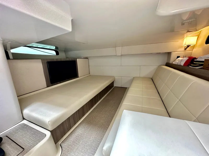 Slide: The Image of Interior of 2022 Regal 36 XO yacht with helm and screen. - 29
