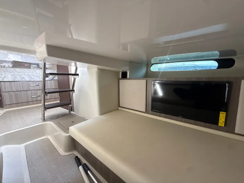 Slide: The Image of Interior view of 2022 Regal 36 XO yacht at the marina. - 31