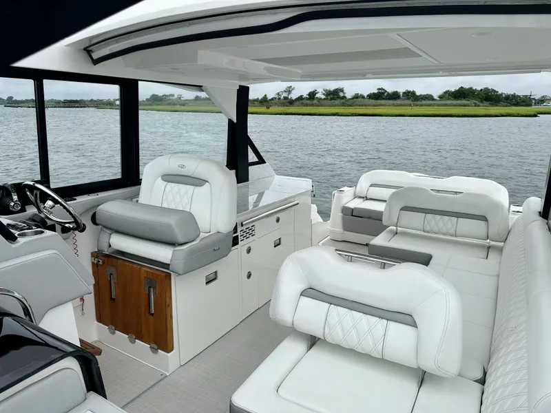 Slide: The Image of Luxurious seating on Regal 36 XO boat, model year 2022. - 32