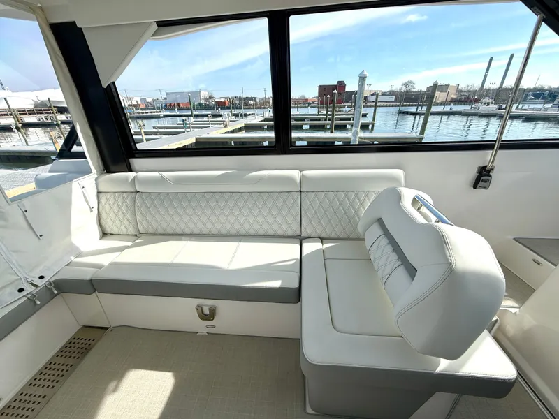 Slide: The Image of Interior of 2022 Regal 36 XO yacht with luxurious seating. - 45