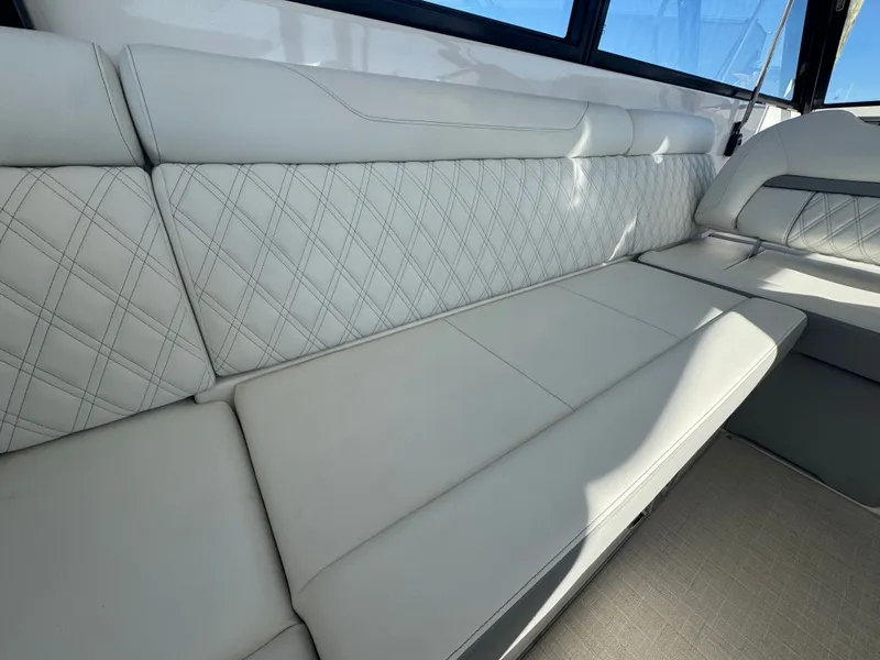 Slide: The Image of Interior of 2022 Regal 36 XO with luxurious upholstery. - 46