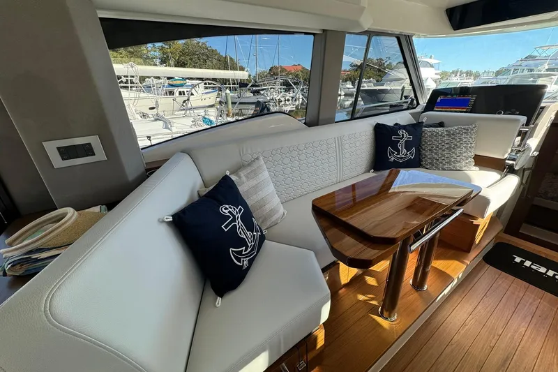 Slide: The Image of Interior of 2025 Tiara Yachts 43 LE with elegant seating and nautical decor. - 32