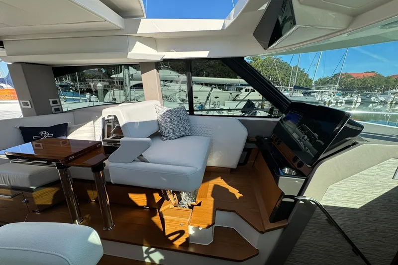 Slide: The Image of Luxurious interior of 2025 Tiara Yachts 43 LE with elegant seating and modern design. - 40