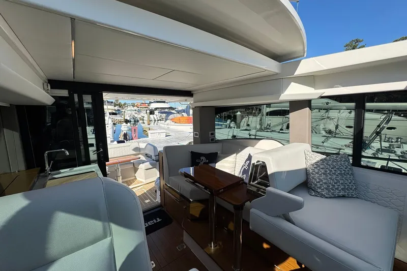 Slide: The Image of Luxurious interior of 2025 Tiara Yachts 43 LE, featuring elegant seating and modern design. - 41