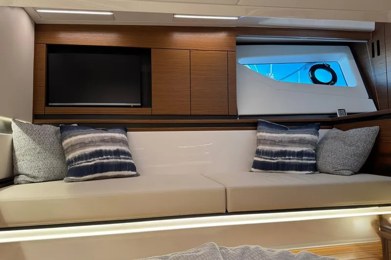 Slide: The Image of Luxurious interior of 2025 Tiara Yachts 43 LE with elegant seating and modern design. - 52