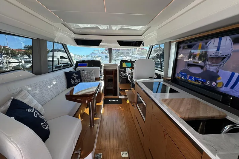 Slide: The Image of Luxurious interior of 2025 Tiara Yachts 43 LE with modern amenities and sleek design. - 59