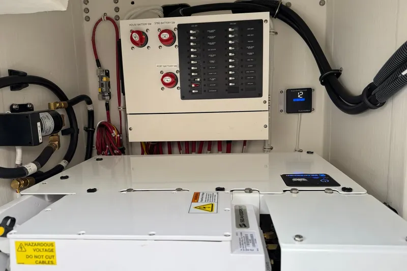 Slide: The Image of Electrical panel and battery system in 2025 Tiara Yachts 43 LE. - 79