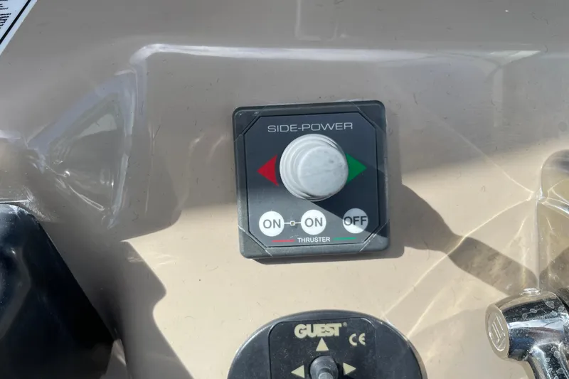 Slide: The Image of Bow of 2005 Sea Ray 340 Sundancer docked, featuring anchor and railing. - 20