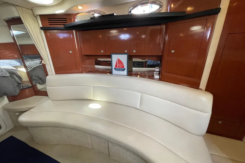 Slide: The Image of Luxurious interior of 2005 Sea Ray 340 Sundancer yacht with cozy seating and modern amenities. - 23