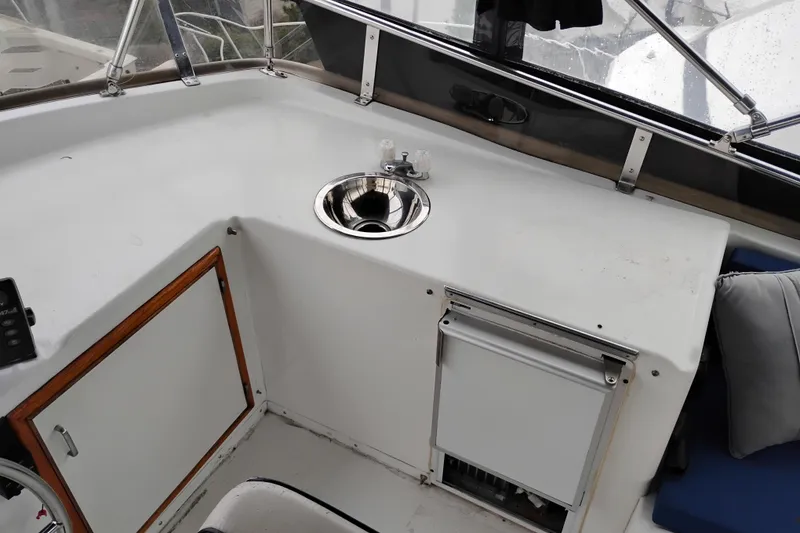 Slide: The Image of 1991 Jefferson 48 Rivanna Sundeck interior with sink and storage area. - 22