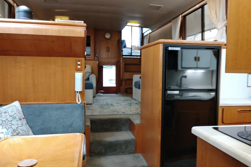 Slide: The Image of Interior of 1991 Jefferson 48 Rivanna Sundeck yacht with wood finishes and modern amenities. - 59