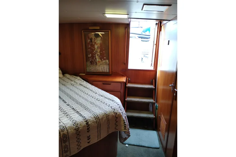 Slide: The Image of Interior of 1991 Jefferson 48 Rivanna Sundeck with bed, stairs, and artwork. - 61