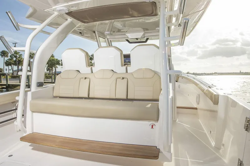 Slide: The Image of 2019 Pursuit S 408 Sport boat with open deck kitchen and Yamaha engines. - 17