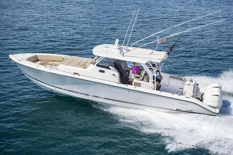 Slide: The Image of Manufacturer Provided Image: 2019 Pursuit S 408 Sport boat cruising on the ocean. - 3