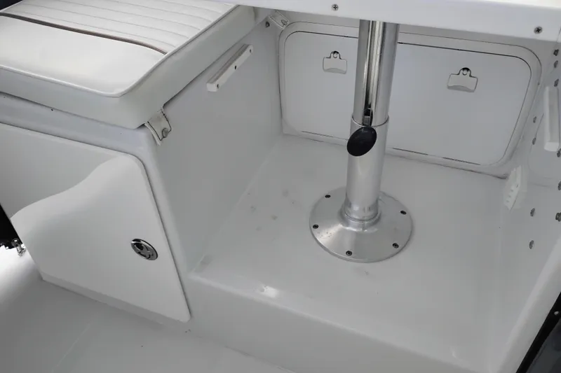 Slide: The Image of 2007 Glacier Bay 2685 Coastal Runner interior seating and storage area. - 15