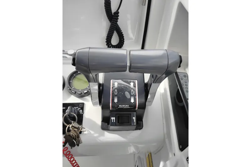 Slide: The Image of Control panel of 2007 Glacier Bay 2685 Coastal Runner boat with Suzuki throttle. - 24