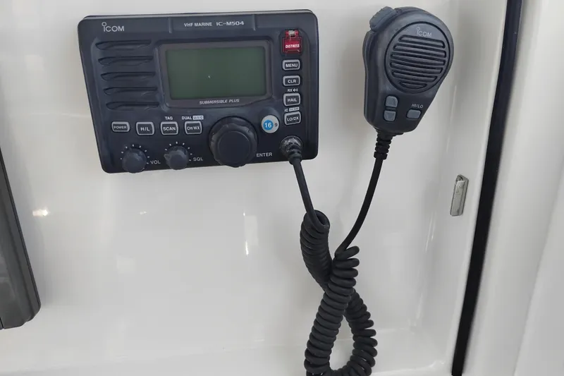 Slide: The Image of VHF marine radio on 2007 Glacier Bay 2685 Coastal Runner boat dashboard. - 28