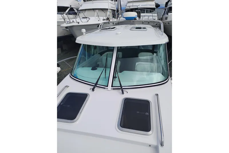 Slide: The Image of 2007 Glacier Bay 2685 Coastal Runner boat with sleek design and spacious cabin. - 40