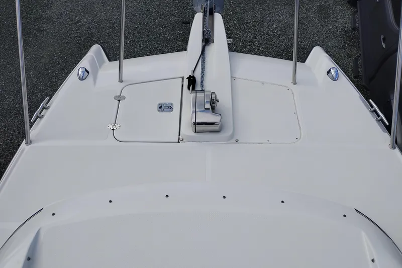 Slide: The Image of 2007 Glacier Bay 2685 Coastal Runner boat deck with anchor and hatch. - 42