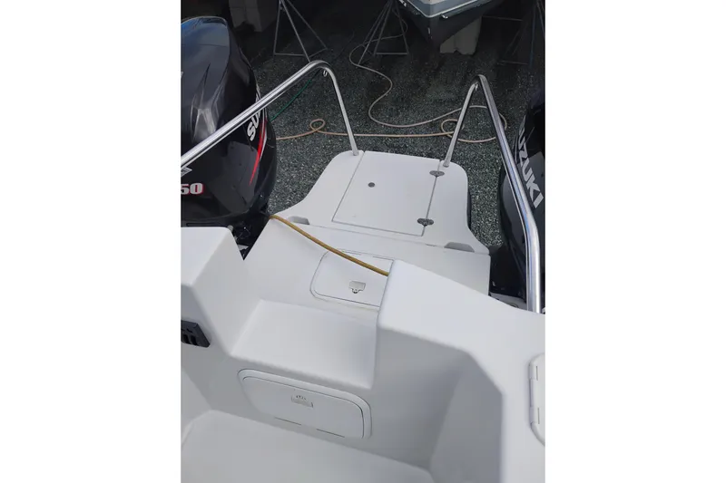 Slide: The Image of 2007 Glacier Bay 2685 Coastal Runner boat with Suzuki outboard engines. - 6