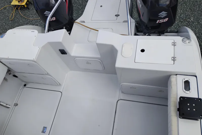 Slide: The Image of 2007 Glacier Bay 2685 Coastal Runner boat deck with Suzuki 150 engines. - 7