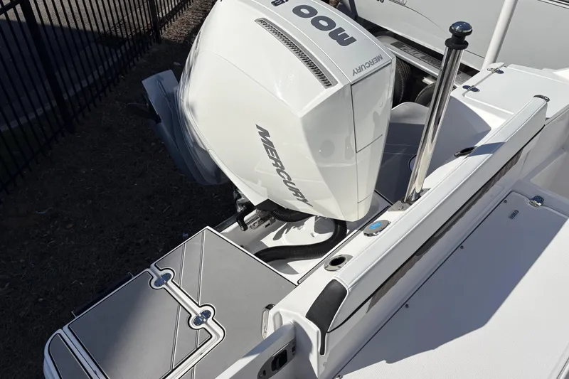 Slide: The Image of 2024 Blackfin 222CC boat with Mercury outboard engine, viewed from above. - 26